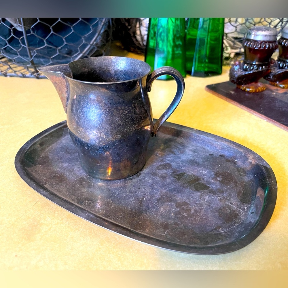 WM Paul Revere Reproduction silver creamer with small tray. Used, tarnished.